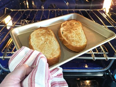Instructions. Preheat the oven to 350℉. Place the roasting rack on top of the baking pan. Put one slice of bread in each notch of the rack, making sure the bread is standing upright and not touching the slice in front of it. Place the pan in the oven to bake for 5 to 8 minutes, until the slices begin to brown.
